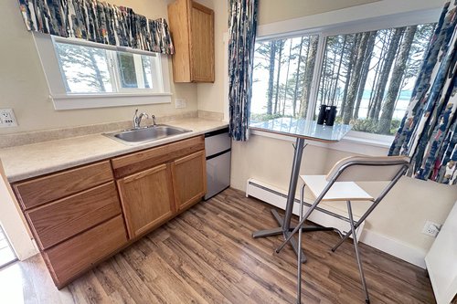 Kitchenette is equipped with enough for a tasty meal.