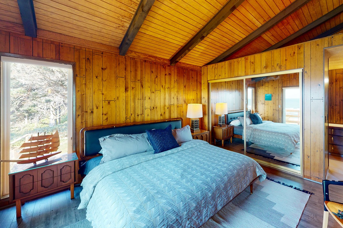 One of the bedrooms with an ensuite bath and king bed.