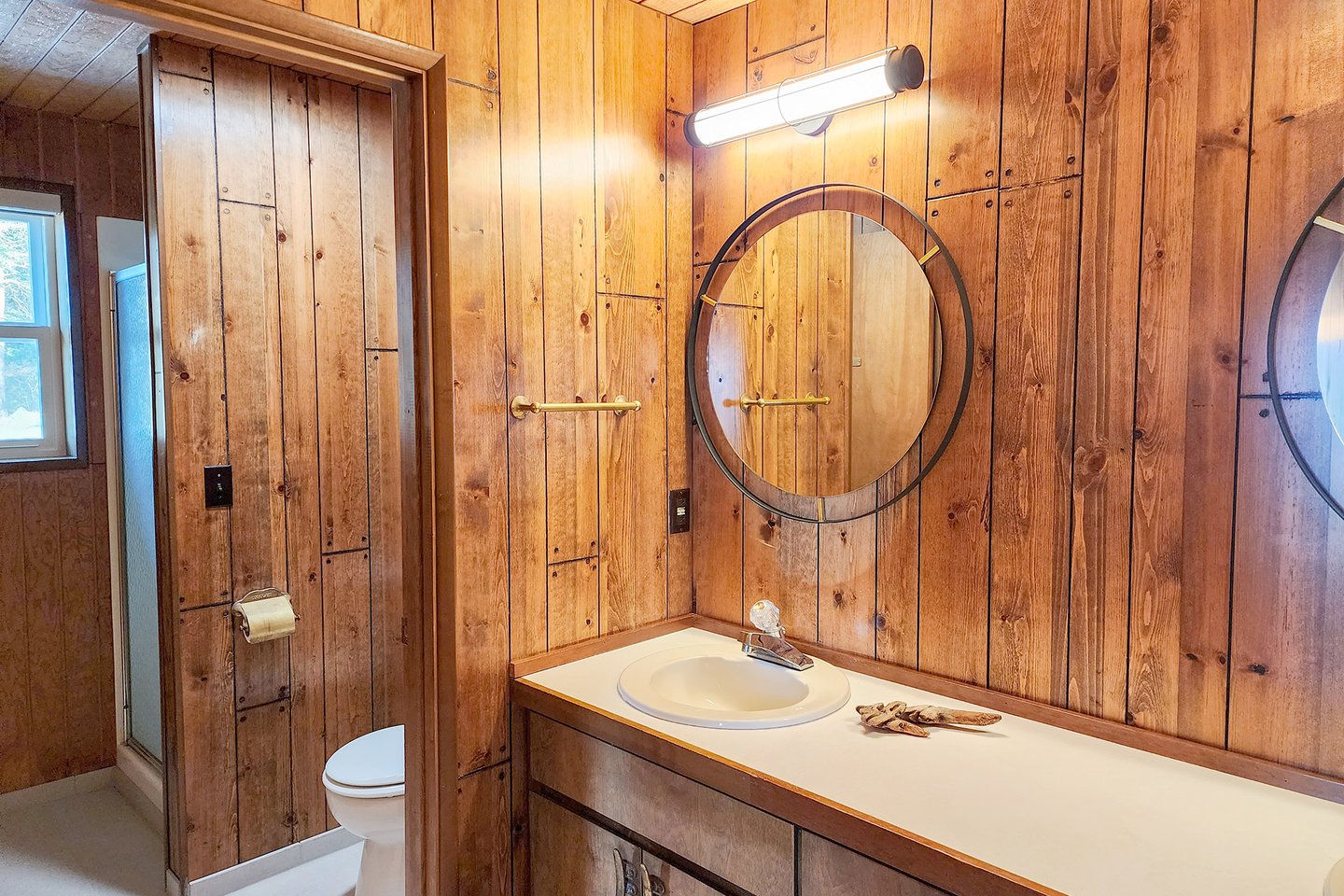 Ensuite bath includes a double vanity and walk in shower.