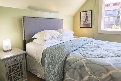 The second bedroom also boasts a queen bed