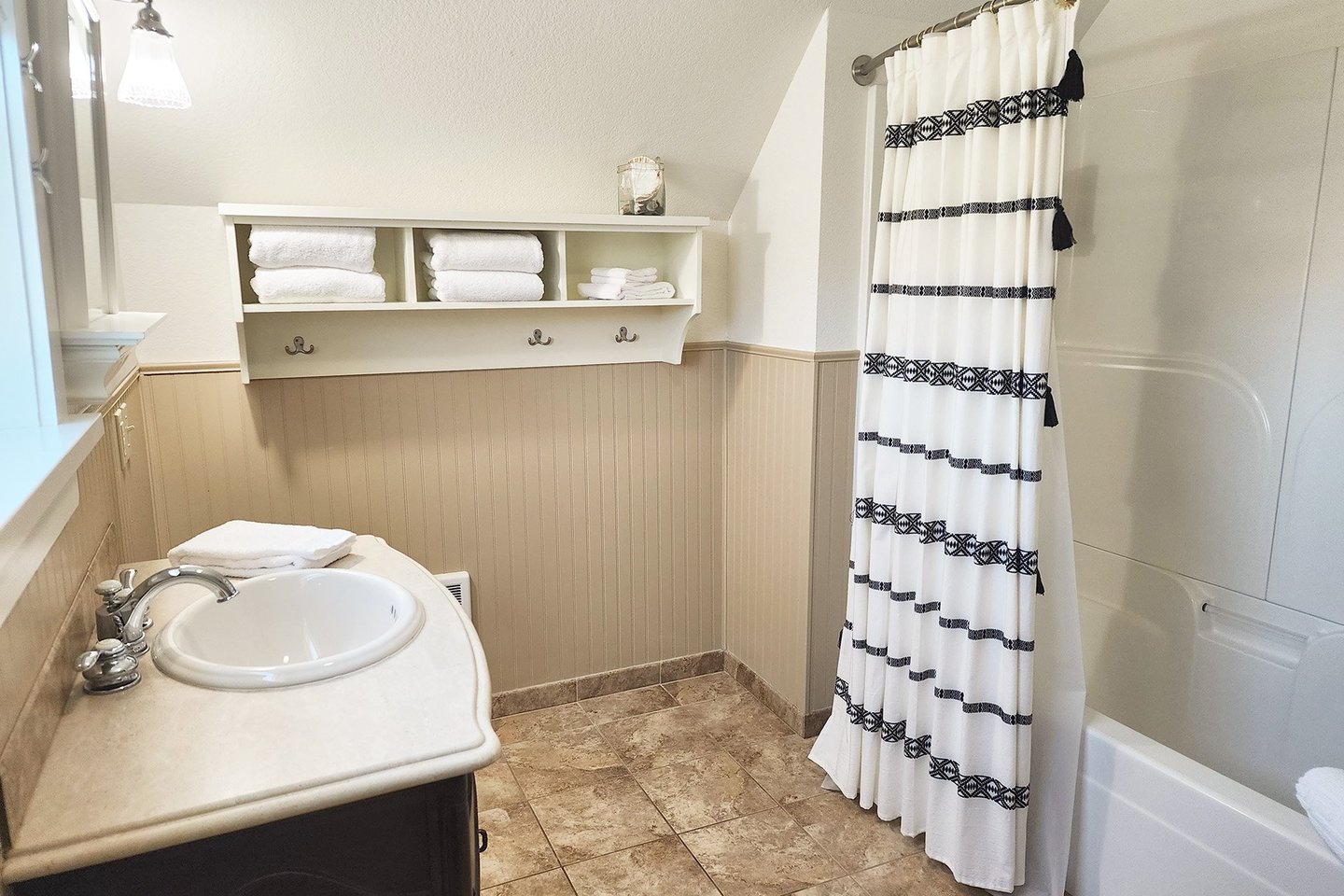 A large full bath awaits!