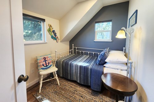 Twin bed is in a separate room attached to the third bedroom upstairs.