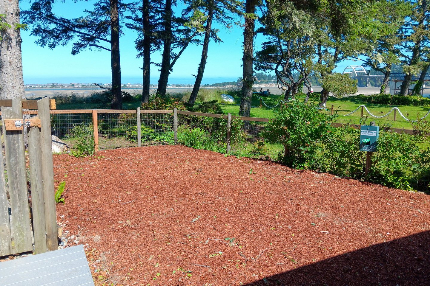 There's an area with a view of the Alsea Bay just for your pups to play.