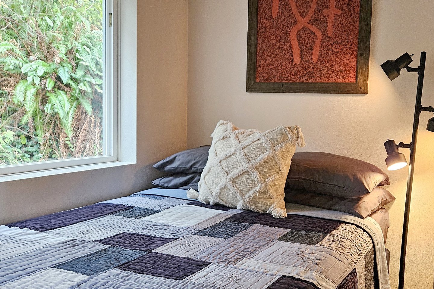 Small second bedroom with full bed.
