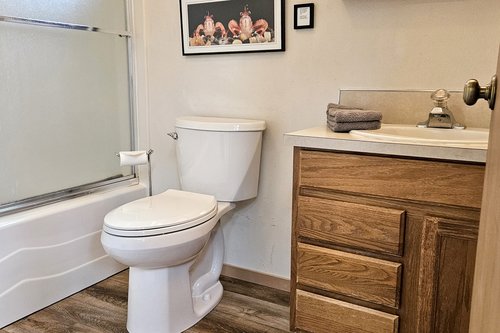 Bath with tub/shower combo.