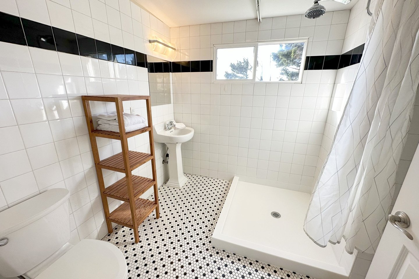 The bath with a shower.