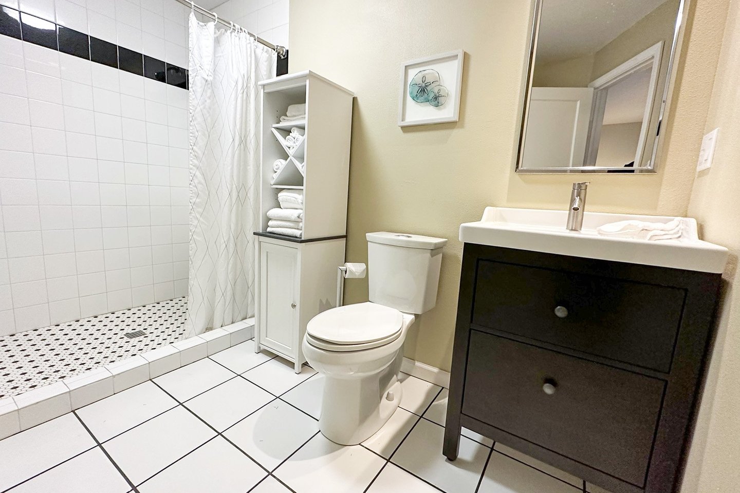 Barhroom with a walk in shower.