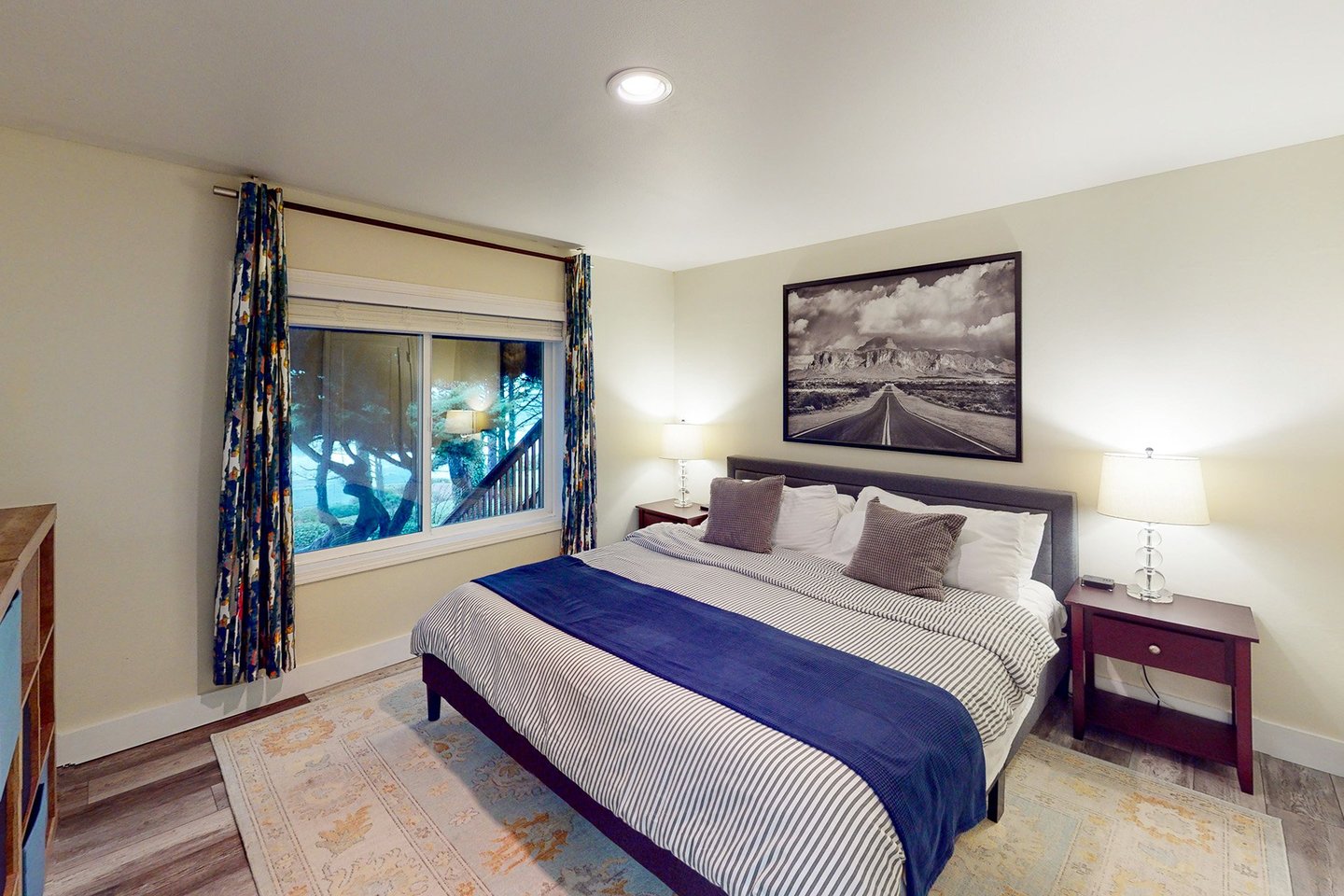 Comfy king bed in the bedroom.