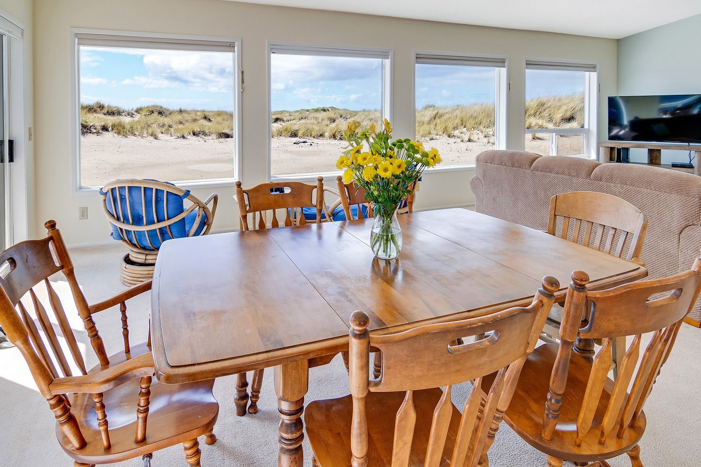 Sit at the dining table and enjoy the views with your meal.