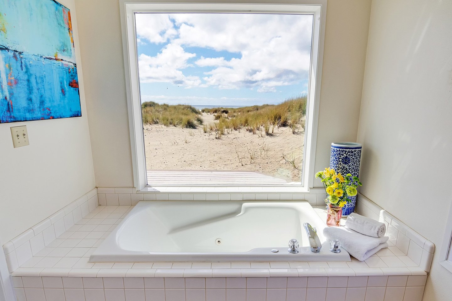The ensuite bath boasts a jetted tub with a view.