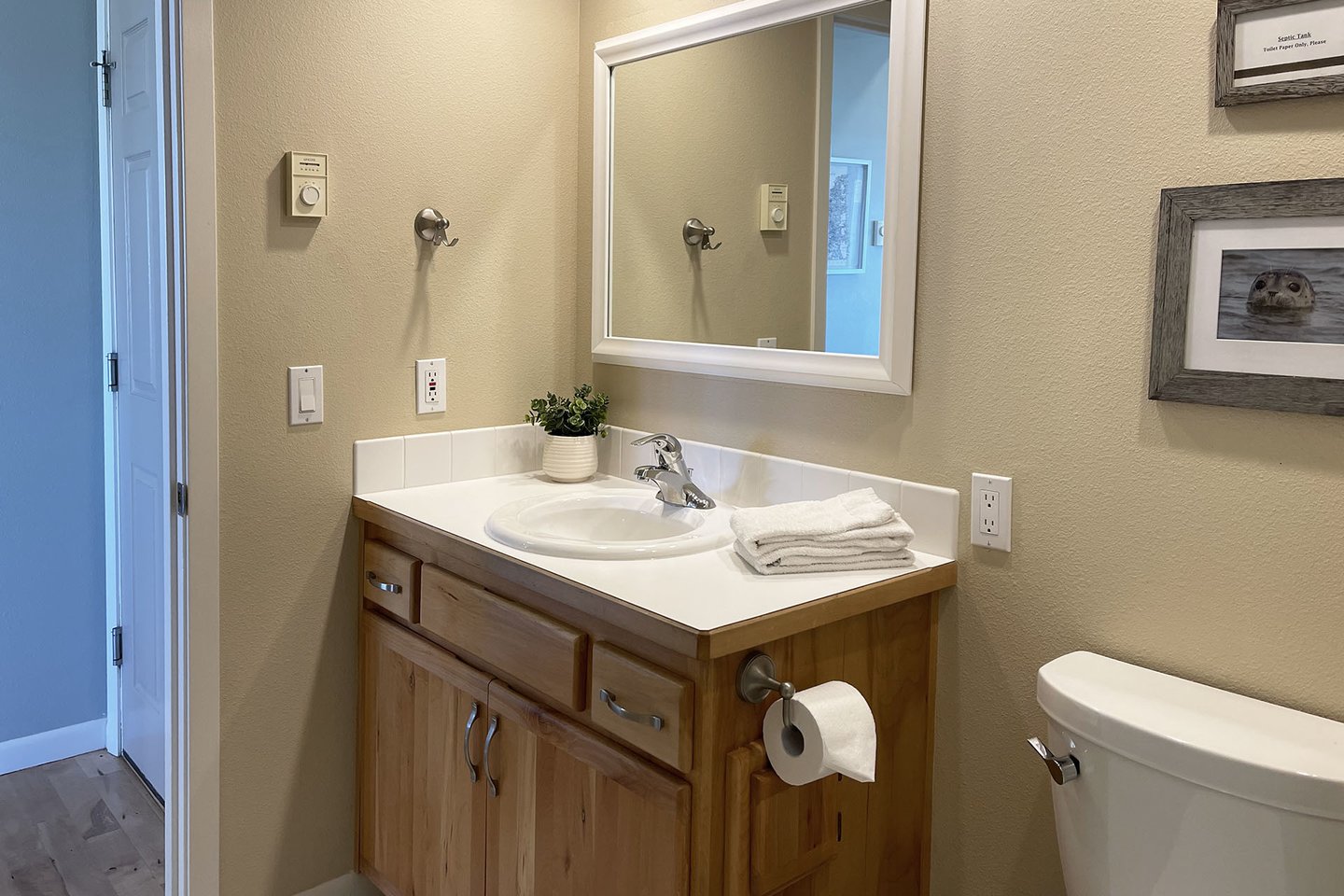 The second bathroom opens up to the bedroom or the kitchen.