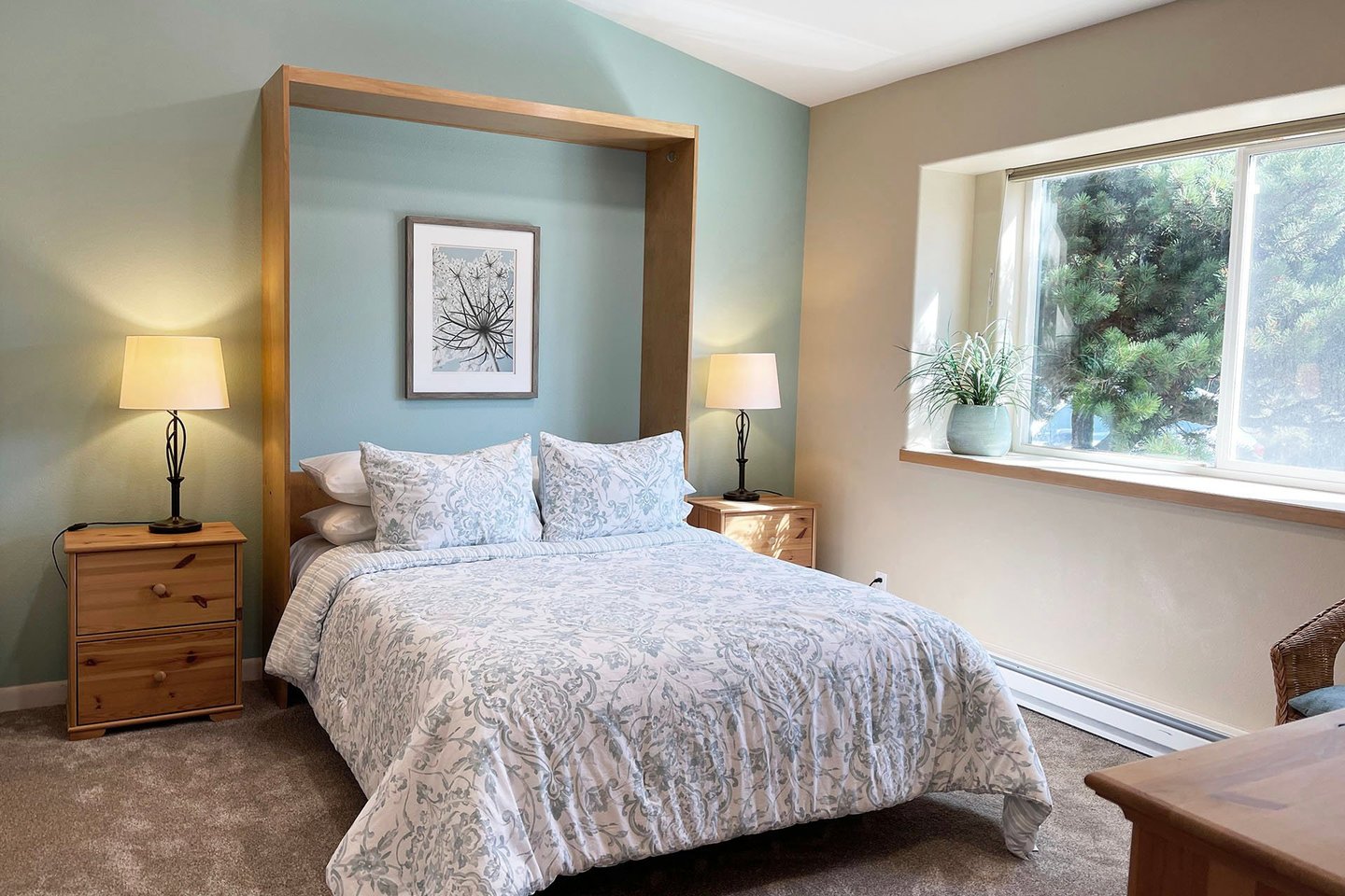 The second bedroom features a comfy queen bed.