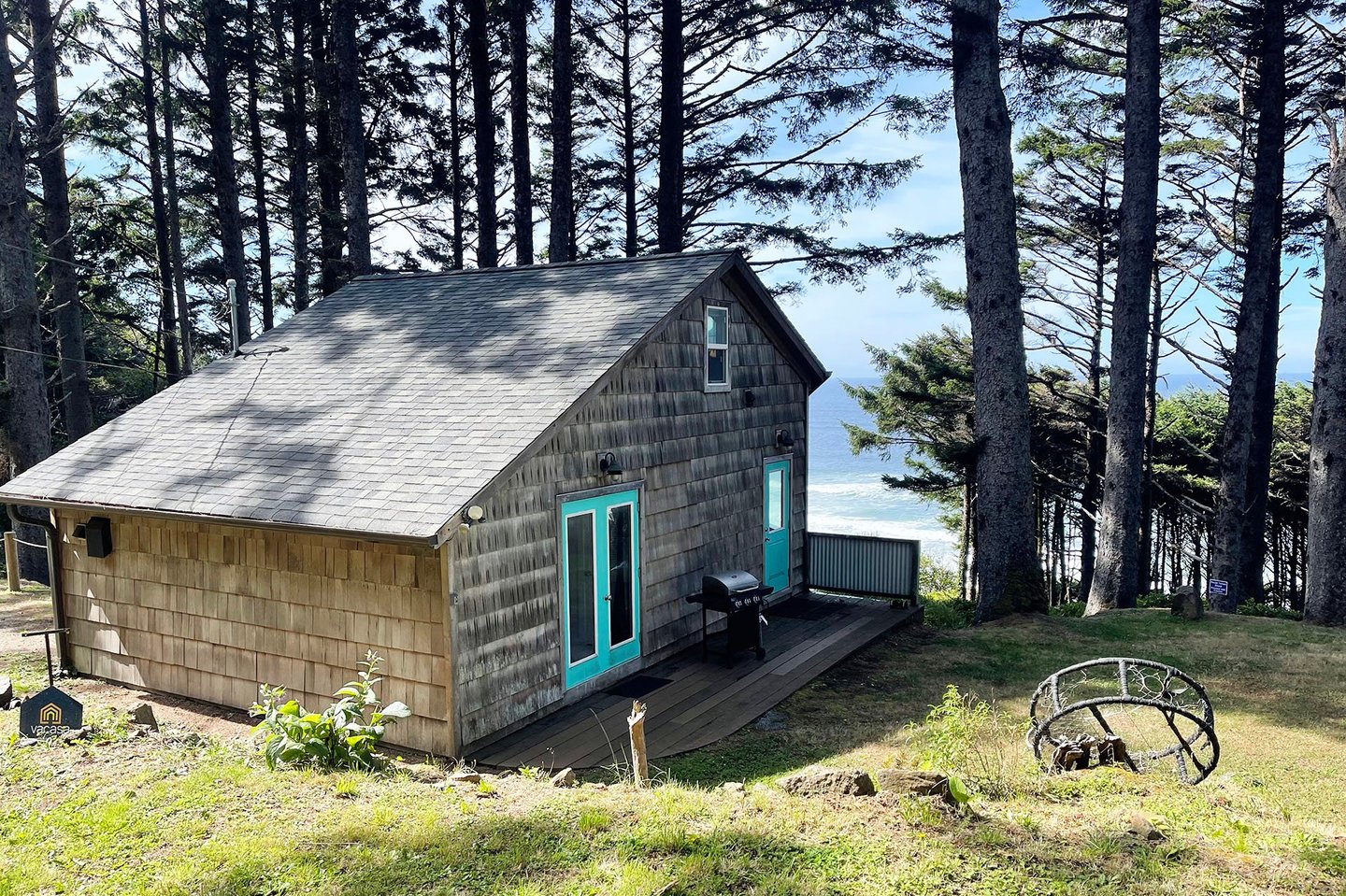 Cozy cabin perched above the Pacific Ocean.