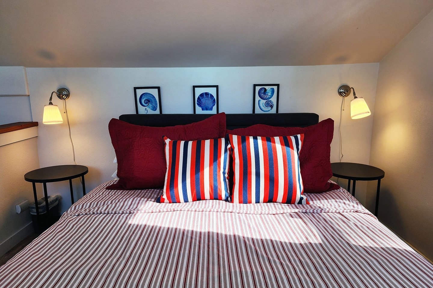 Upstairs loft bed is a comfy queen bed.