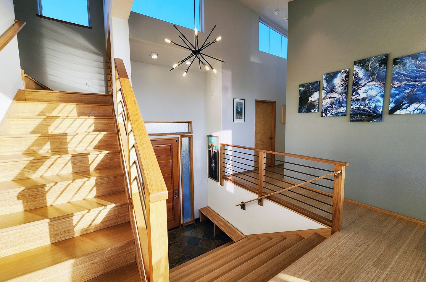 Stairs bring you to the main living space and down the hall to two bedrooms.