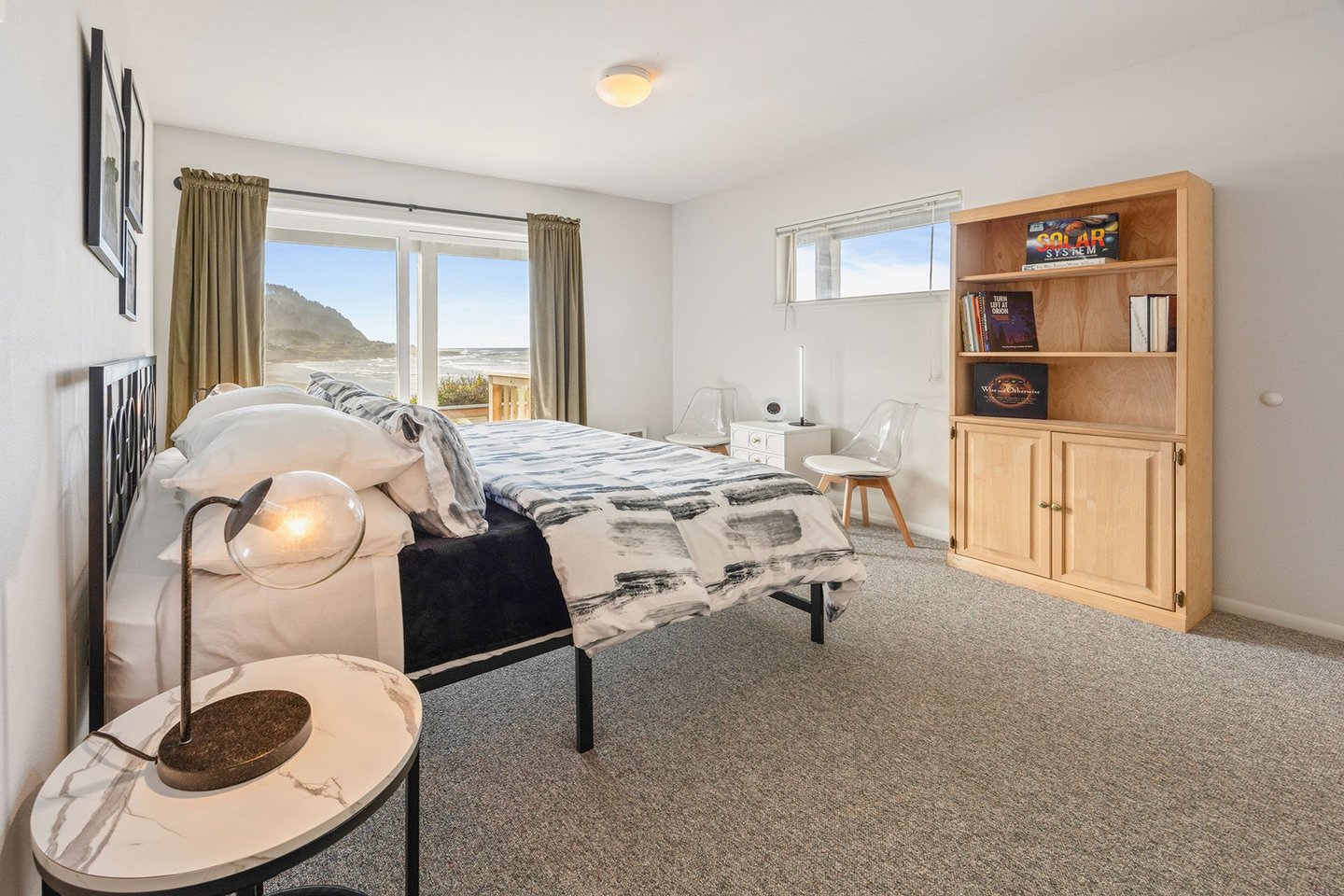 Another bedroom with access to the deck and hot tub has a king bed that can be split into two twins.