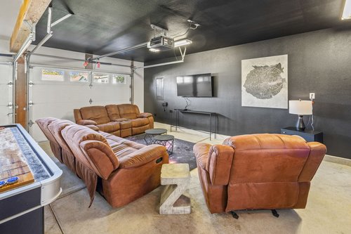 The game room in the garage has a TV and multiple games!