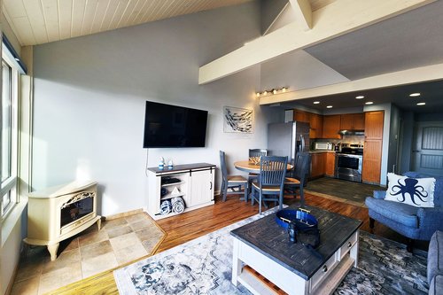 Living, dining and kitchen all open concept.