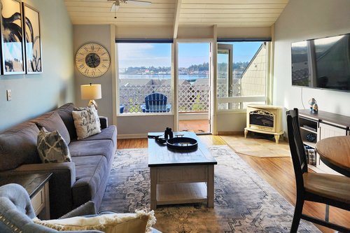 Open and spacious condo with views of the harbor.