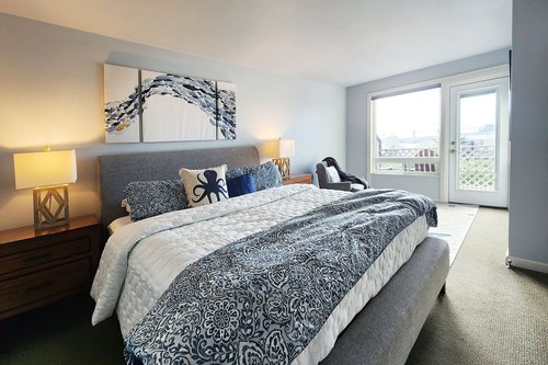 Large wonderful primary suite with views, deck, and bathroom.