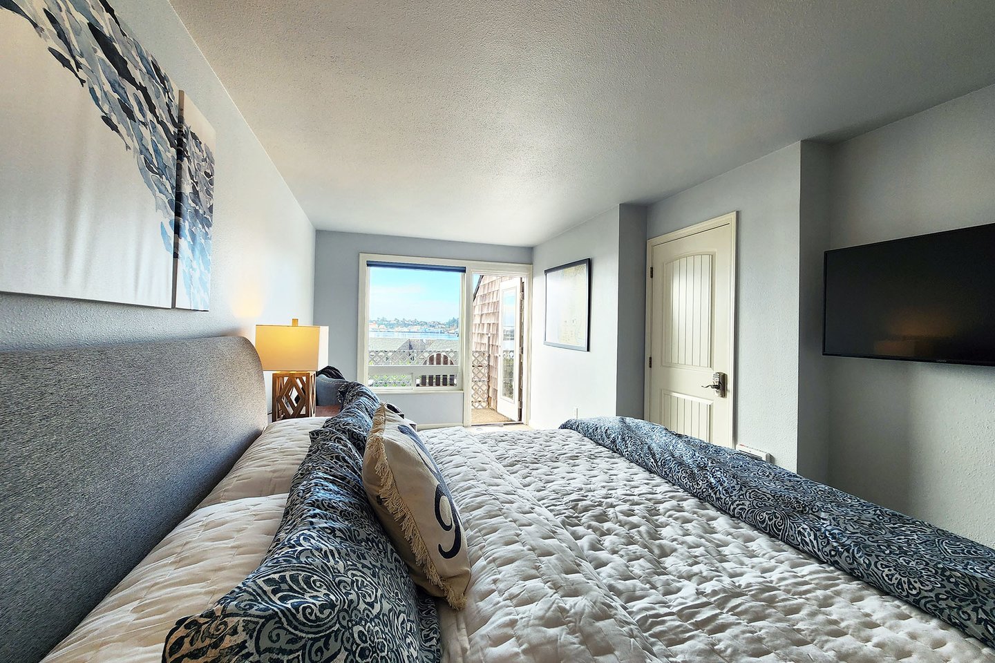 Comfy king bed and private deck await!
