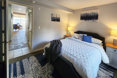 Curl up and sleep in this wonderful queen bed.