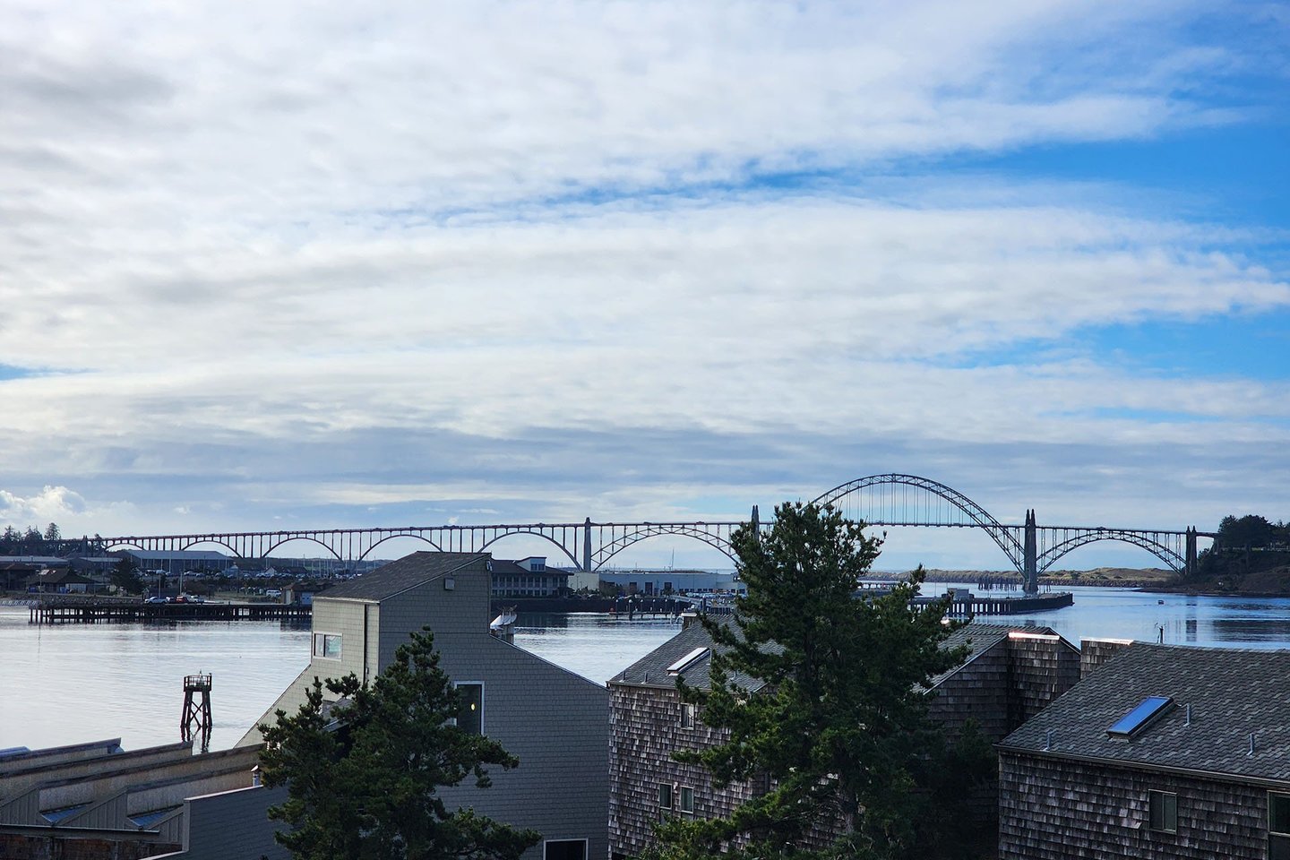 Watch the fishing fleet, sail boats, even the Coast Guard come and go under the bridge.