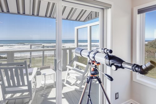 Look out for whales or other wildlife from this ocean front home.