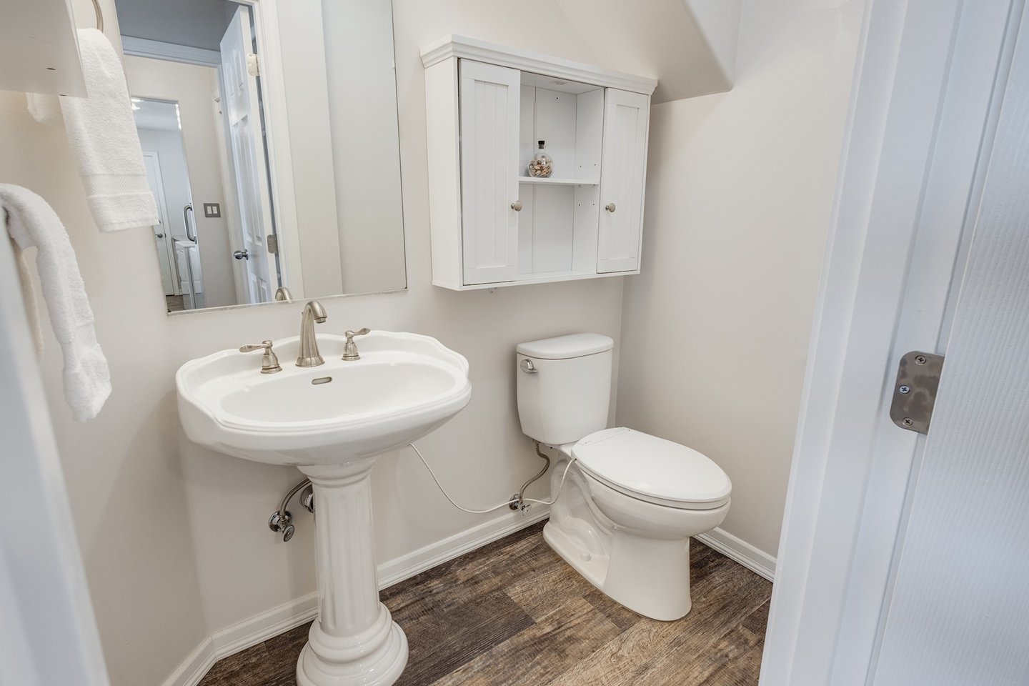 Half bath located by the kitchen.