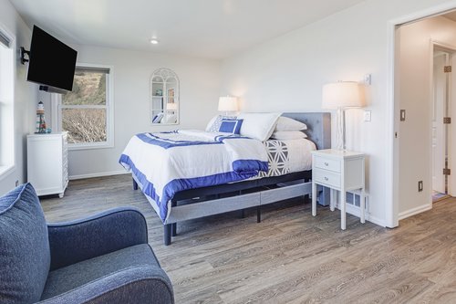 The primary suite has a king bed and ocean views on the second level!