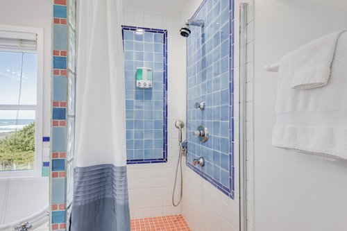 Tiled walk in shower.