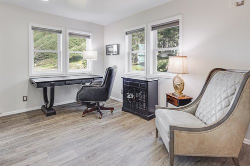 At the other end of the Primary Suite space is an office.