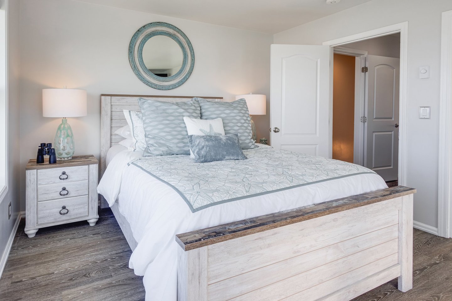 Cozy up in this queen bed in the third bedroom upstairs.