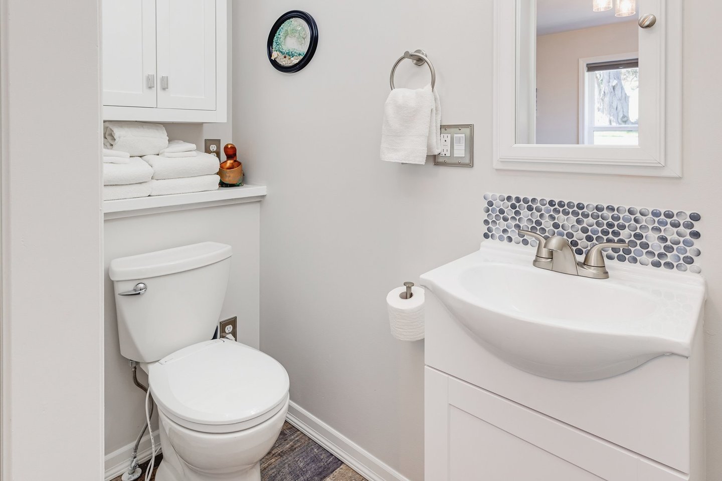 Ensuite bath with bedroom one on the main level.
