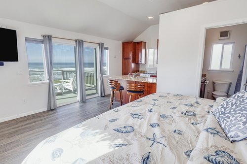 The guest suite has an ensuite bath, kitchenette, and king bed.