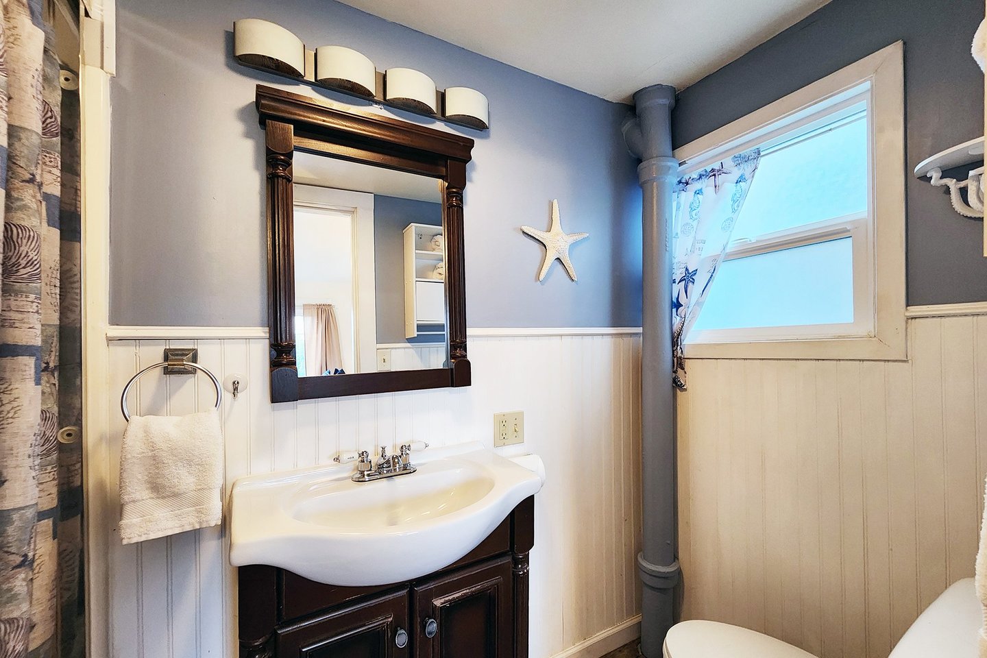Main floor bath is an ensuite with the bedroom.