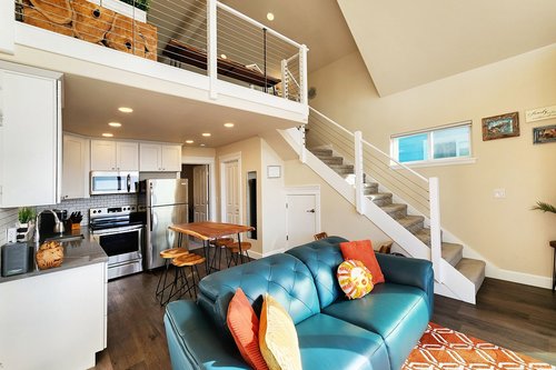 Sit and watch the ocean in this sunny cottage.