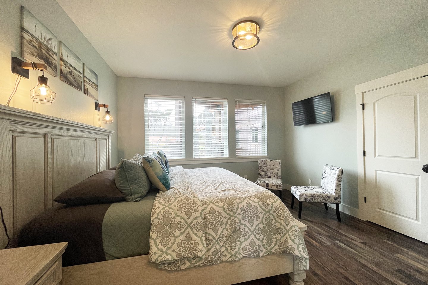 Bedroom two on the ground floor with king bed.