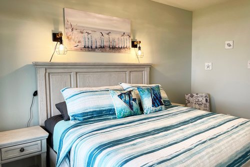 Bedroom three on the ground floor with king bed.