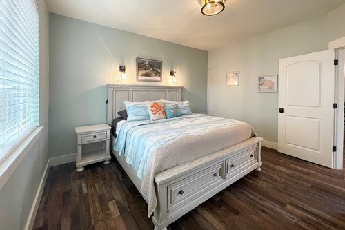 Cozy up in the King bed in this spacious bedroom.