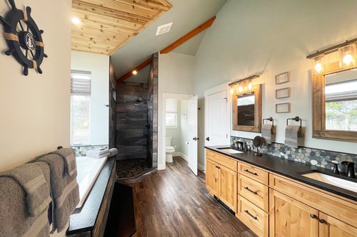 Primary suite on the upper level has its own bath.