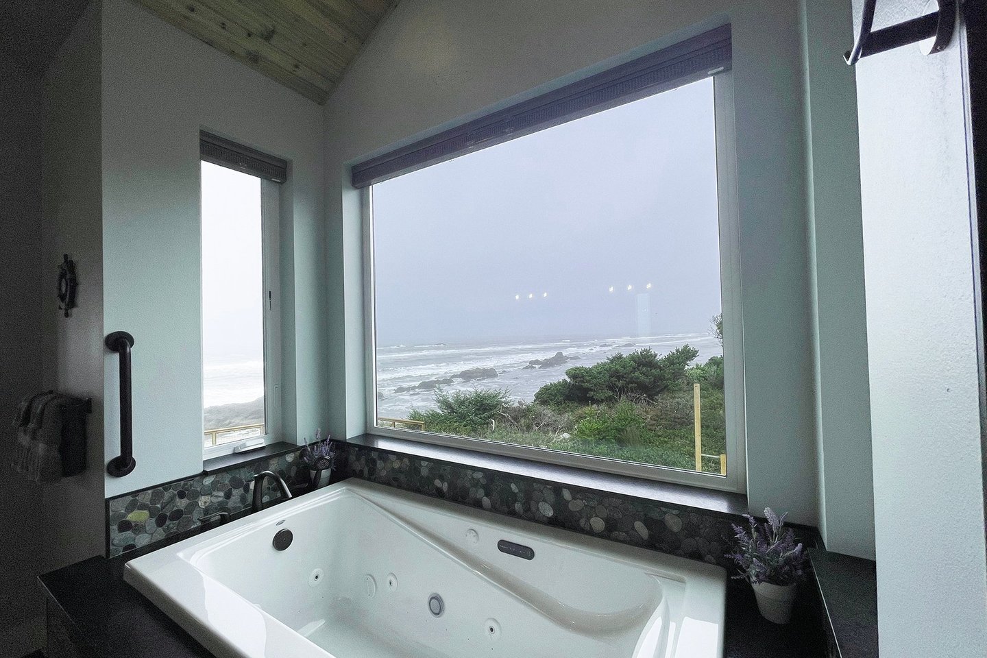 Watch the waves from the jetted tub in the Primary ensuite.