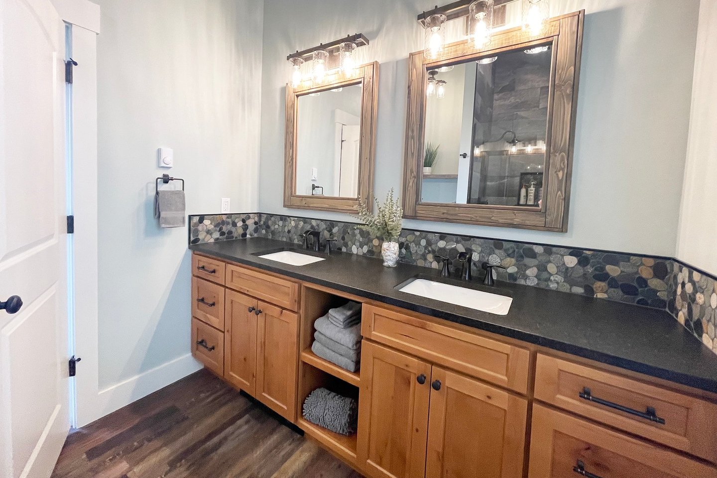 Spacious vanity in the hall bath on the upper level.
