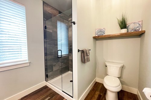 Walk in shower in the hall bath on the upper level.