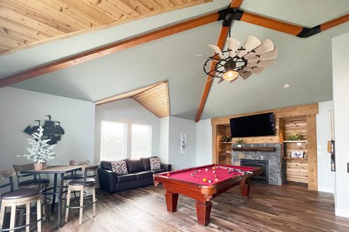 Perfect spot to watch TV, play a game, enjoy the fireplace or just hang out.