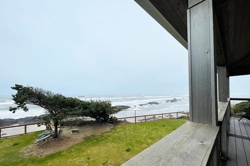 View of the ocean and the large yard.