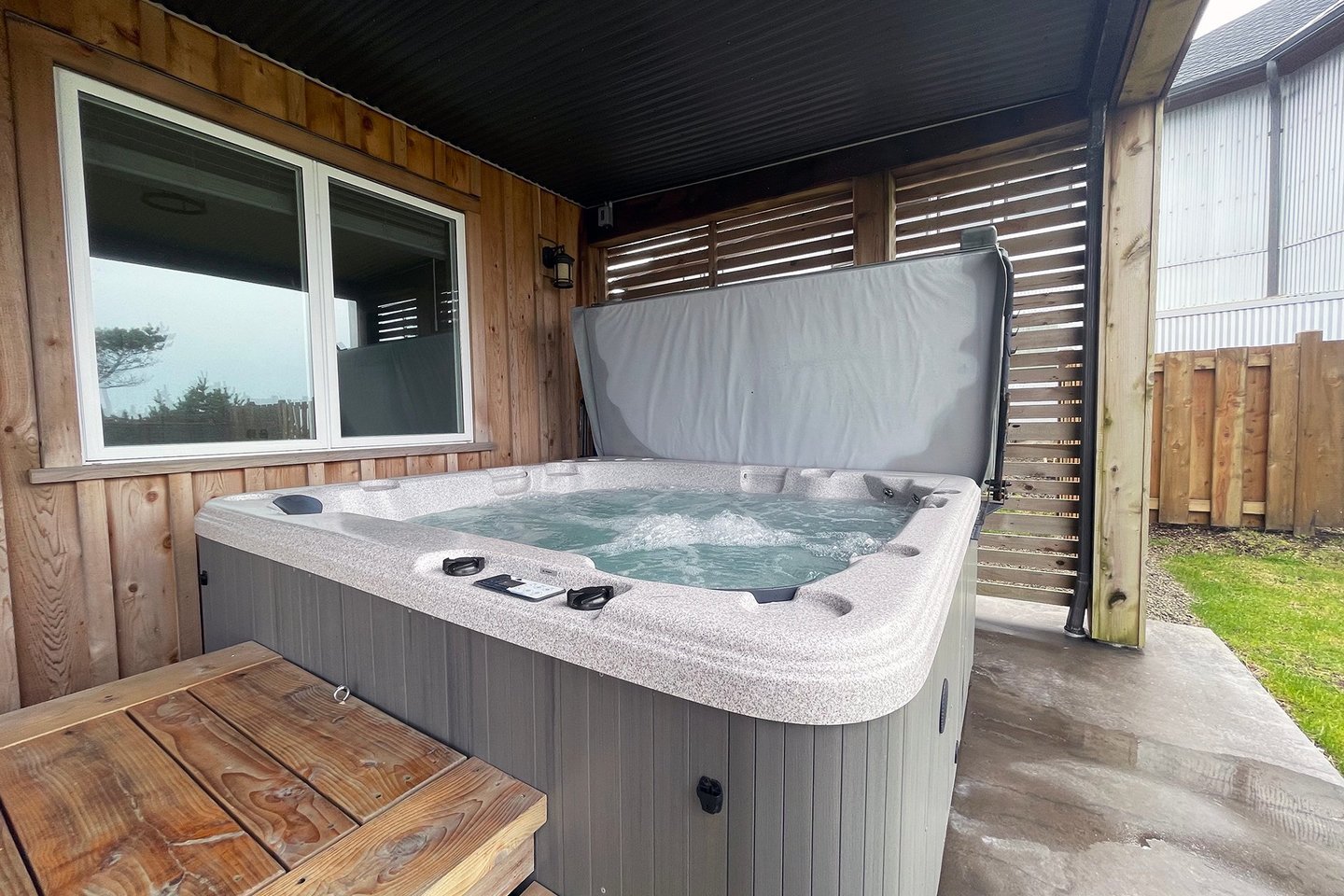 Covered hot tub to enjoy no matter what the weather.