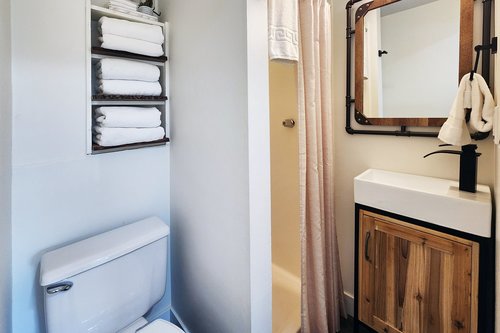 A full bath with shower is shared on the second floor.