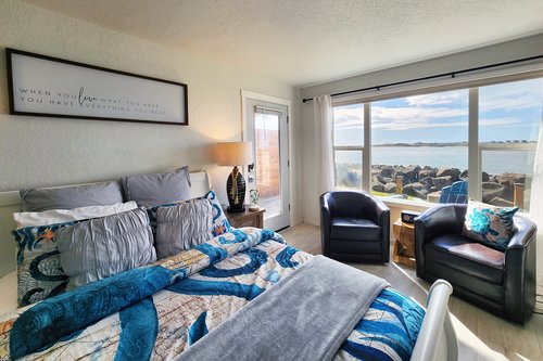 Studio next door with ocean views and comfy Queen bed.