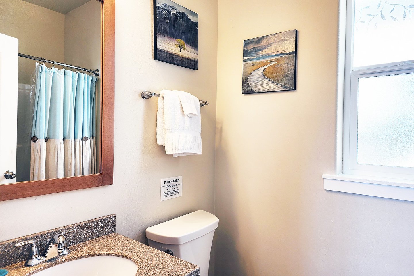 Bath with tub/shower combo.